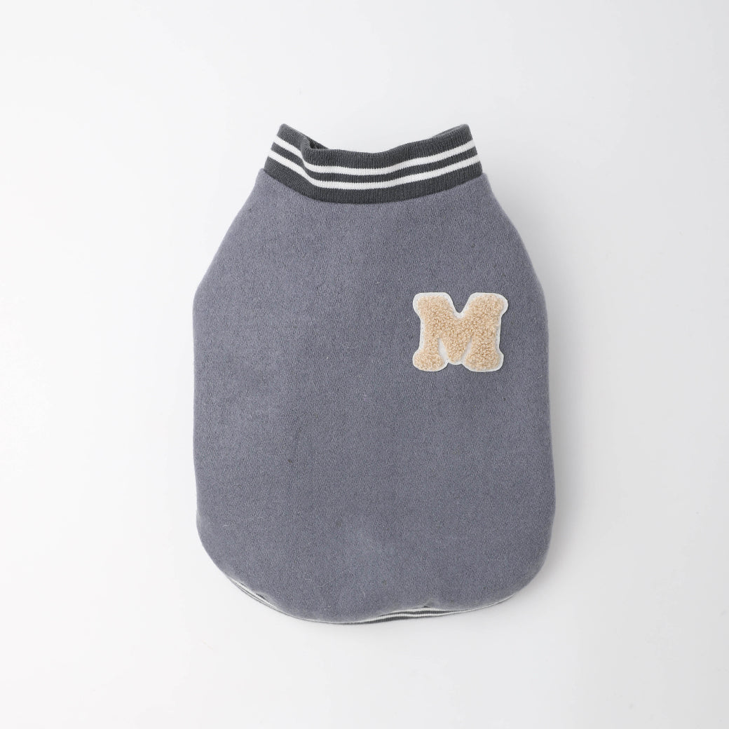 Stadium jacket with patch