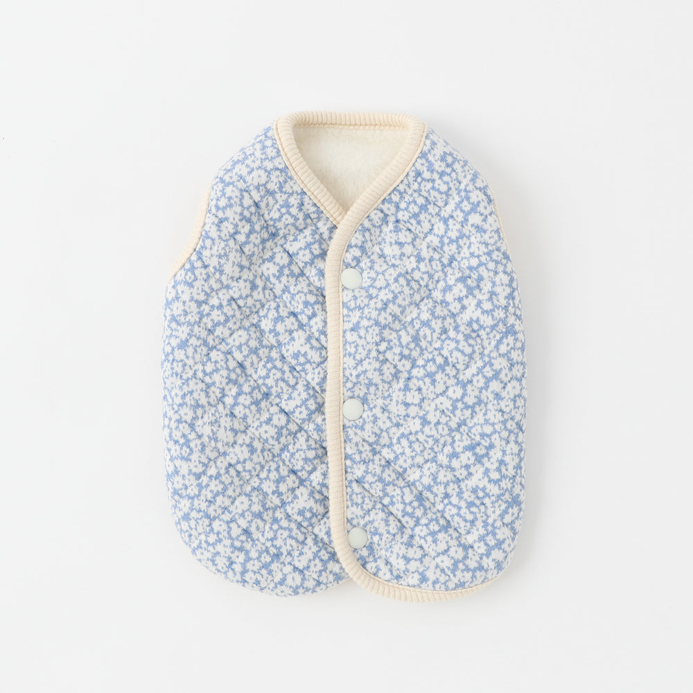 Reversible small floral pattern quilted vest