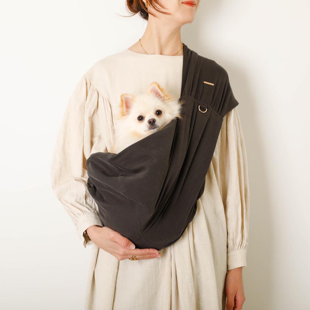 Size adjustable fleece sling with mesh