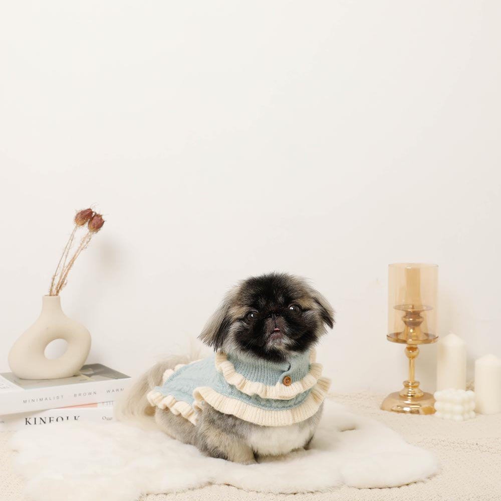 Bicolor frilled cable knit poncho