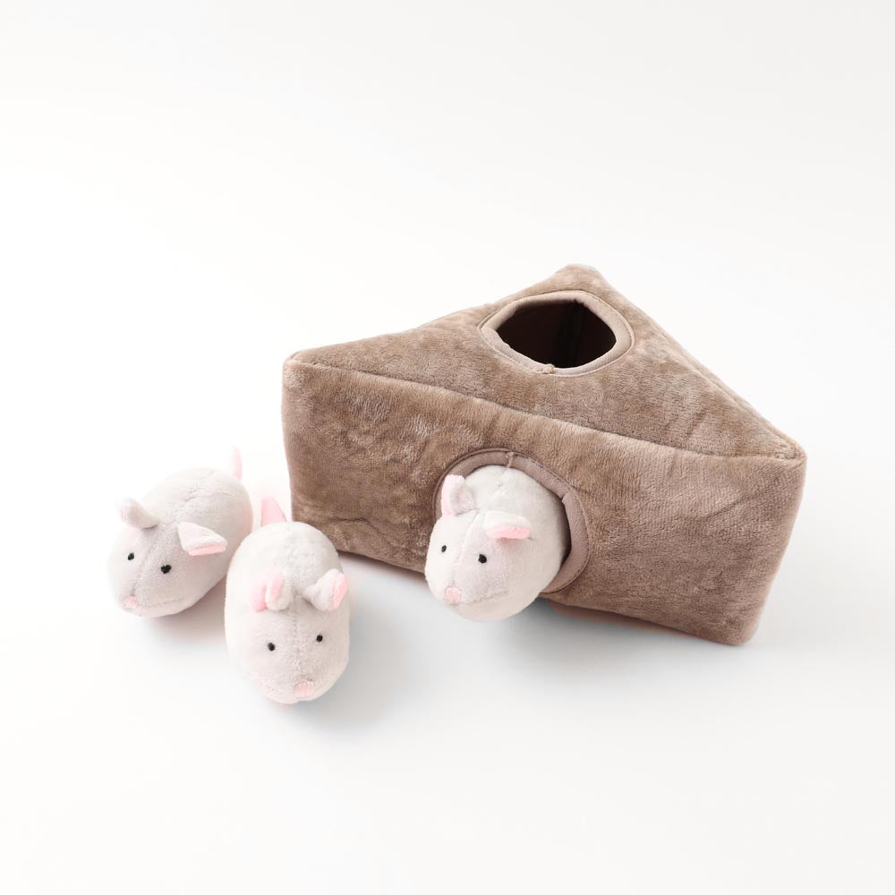 Three mice toy with house