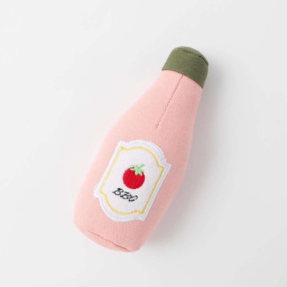 Pink tomato sauce toy